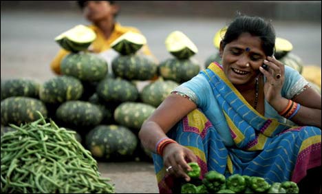 Criticism forces UPA to drop cell phone scheme