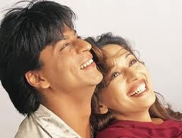 Shah Rukh Khan held her tight and we beheld the couple with a sigh ... Madhuri Dikshit is unlikely to give us a repeat performance in a hurry ... The new year always begins with this deluge of film award ... Is it because we want to teach the Oscars a trick or two before its 