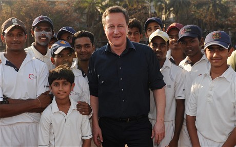 cameron breaks from trade mission to play cricket with mumbai children