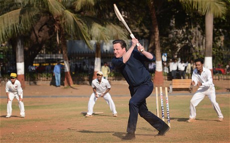 cameron breaks from trade mission to play cricket with mumbai children