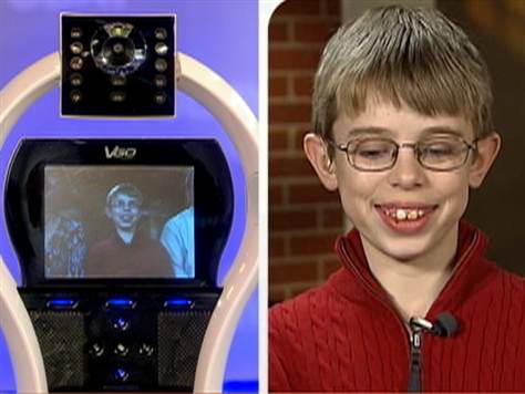 Sick boy uses interactive robot to attend school