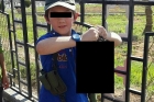 Terrorists ten years son poses in gruesome photo