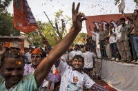 Modi mania worked out once again bjp arrives as largest party in both states