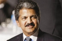 Are you an nri internet is infinitely charmed by anand mahindra reply