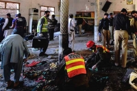 Blast at peshawar religious school kills seven children say officials