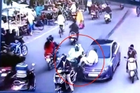 Nagpur shocker traffic police official dragged on bonnet of car he tried to stop