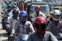 Police giving gifts who wearing helmets