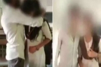 Boy and girl get married in classroom face suspension from college
