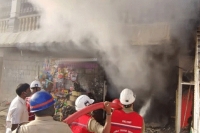 Fire accident at tirumala asthana mandapam shopkeeper burnt alive