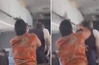 American airlines bans passenger for punching flight attendant after heated argument