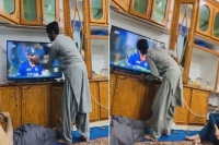 Afghanistan cricket fan kisses hardik pandya on tv screen to celebrate india s victory over pakistan
