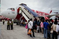 Airasia airline staff harass woman passenger