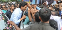 T supporters protest attacked on ys jagan convoy