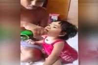 Baby girl cries for beer rejects to drink water