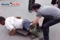 Passerby dragged off beggar trousers to reveal his hidden limbs