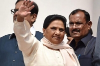 Sp infighting staged to hide govt failures says mayawati