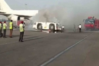 Watch towing vehicle catches fire at delhi airport no casualty reported