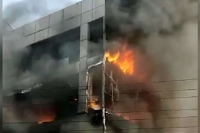 Mundka fire tragedy 27 killed in commercial building blaze in delhi building owner abscondi