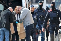 Brussels attacks explosions gunfire in belgian police operation