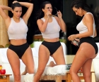 Kim kardashian releases her see through bathing suit photos