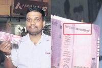 Fake rs 2000 note in axis bank atm in bangalore