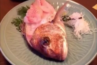 Terrifying moment sashimi fish jump from dinner plate