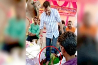 Bjp mp slammed for allowing party man to wash his feet