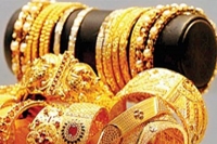 Gold falls by rs 250 to hit 4 month low