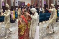 Desi groom welcomes bride at the wedding venue with superb dance performance