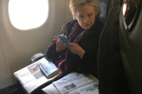 Hillary clinton seen reading about mike pence s private emails