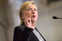 Hillary can testify in writing on emails orders judge