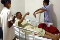 Nurse dances to cheer up paralysis patient during physiotherapy session in viral video