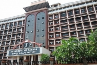 Kerala high court orders ias officer to plant 100 saplings over delayed action