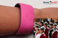 Kids wearing bands to identify caste