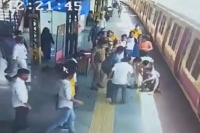 Watch rpf constable saves man from falling into platform gap at mumbai s wadala station