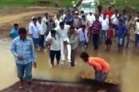 Odisha mla defends being carried by supporters through mud