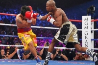 Mayweather beats pacquiao in richest fight ever