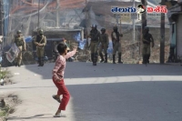 Media shivering with kashmir children throwing stones