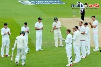 Michael clarke receives a guard of honour from england