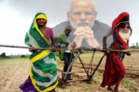 Modi woos rural india with new crop insurance scheme