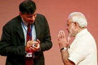 Narendra modi condemns swamy s attack on raghuram rajan