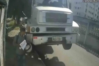 Watch man s incredibly lucky escape after truck veers off road