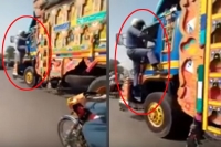 Brave pakistani officer risks life to catch truck driver speeding away after running over a citizen
