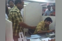 Pawan kalyan goes to bank to exchange ban notes