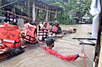 Death toll from landslides floods after tropical storm megi in philippines rises to 67