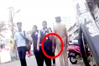 Home guard inappropriately touching women and girls on busy street
