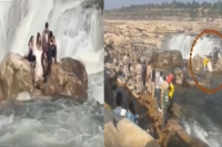 Couple gets stuck in a waterfall during the pre wedding shoot video goes viral