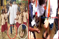 Former union minister holds slippers for rahul gandhi in flooded puducherry