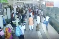 Rpf staffer saves woman passenger from falling under moving train at kalyan station