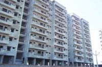 Telangana committee to auction rajiv swagruha houses